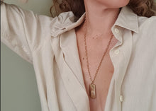 Load image into Gallery viewer, vintage 22ct gold st christopher necklace on woman