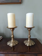 Load image into Gallery viewer, Pair of antique brass candlestick holders