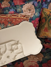 Load image into Gallery viewer, art deco mirror on floral sofa