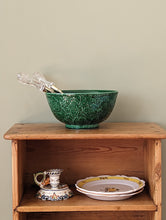 Load image into Gallery viewer, green majolica bowl with serving tongs on wooden shelf