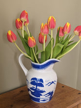 Load image into Gallery viewer, blue and white jug with orange tulips