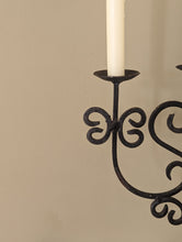 Load image into Gallery viewer, black metal candlestick holder on wooden shelf
