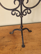 Load image into Gallery viewer, black metal candlestick holder on wooden shelf