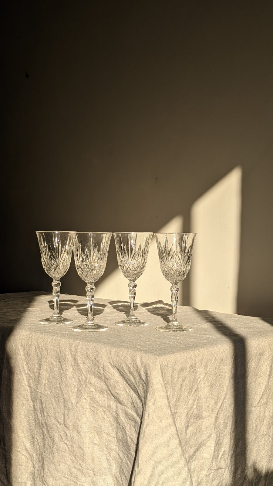 Set of four crystal white wine glasses