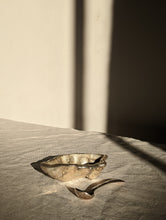 Load image into Gallery viewer, A heavy silver oyster dish with spoon

