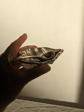 Load image into Gallery viewer, A heavy silver oyster dish with spoon
