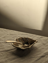 Load image into Gallery viewer, A heavy silver oyster dish with spoon
