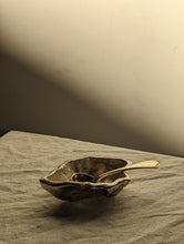 Load image into Gallery viewer, A heavy silver oyster dish with spoon
