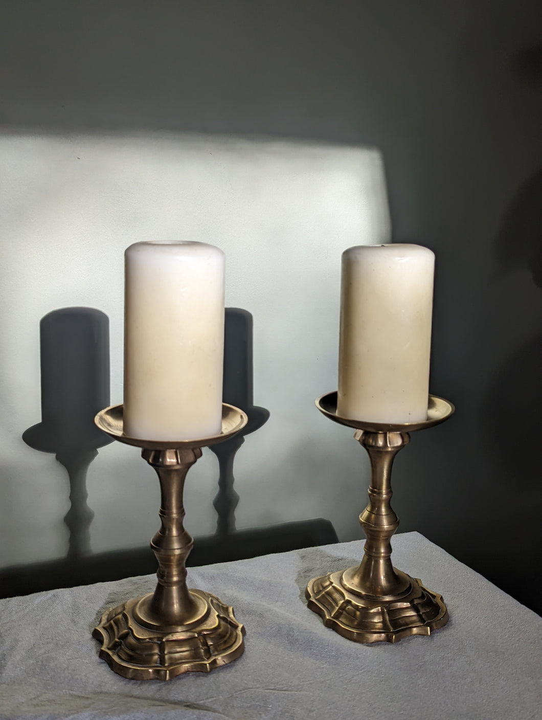 Pair of antique brass candlestick holders