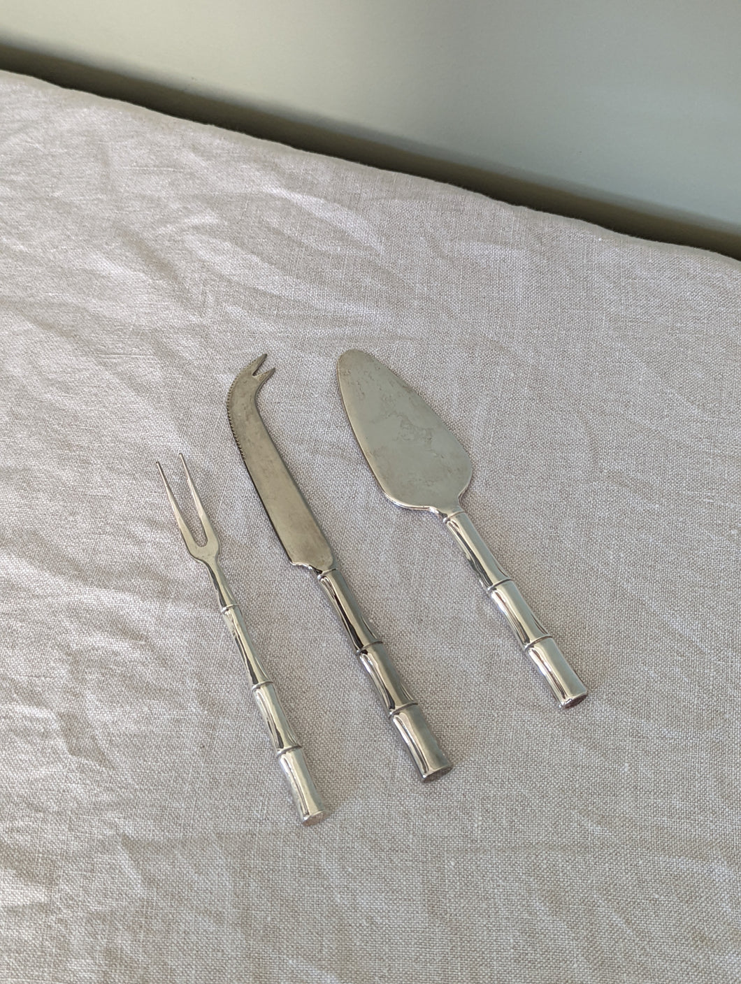 Set of three silver bamboo cheese knives