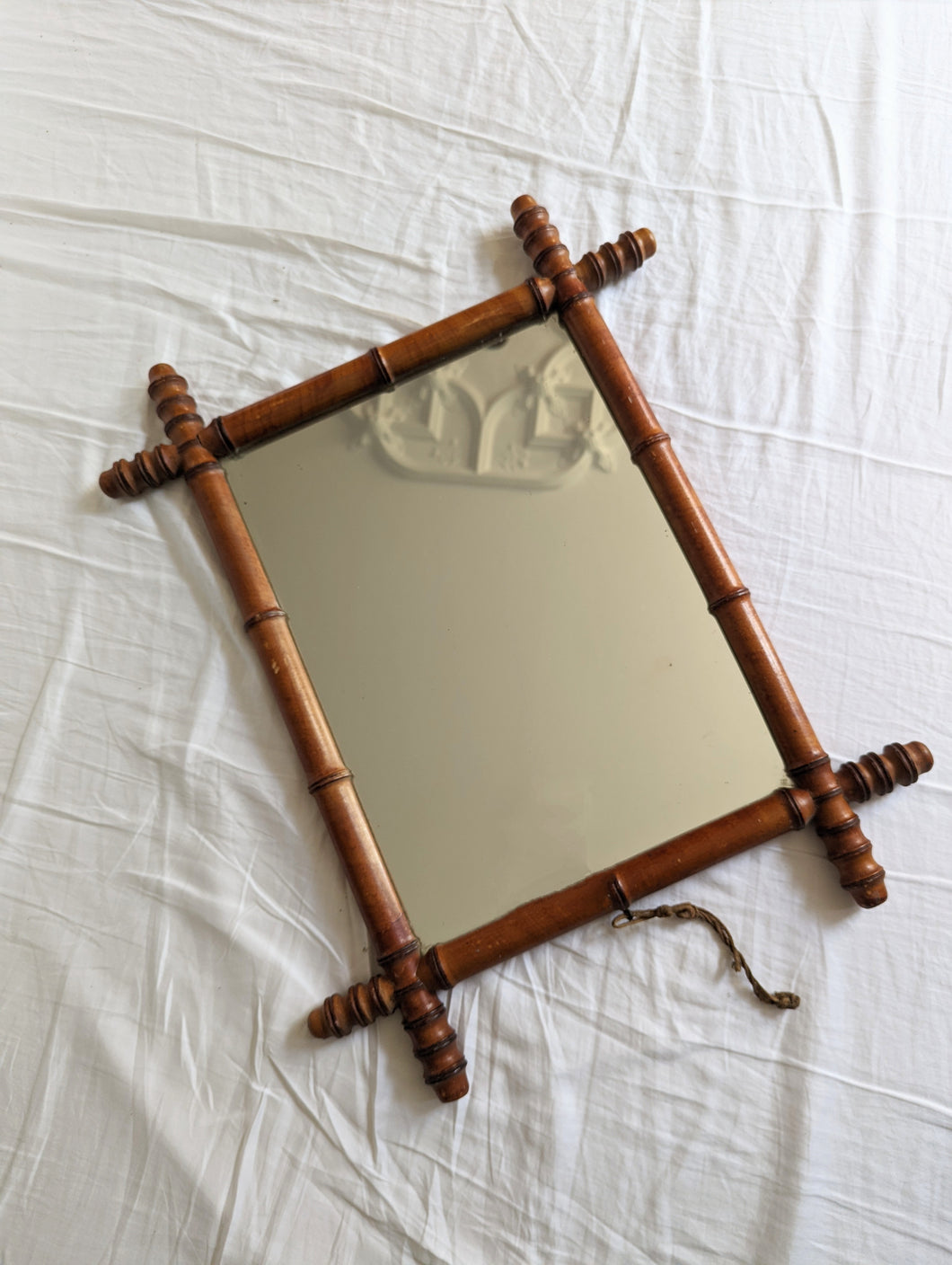 Antique faux bamboo mirror