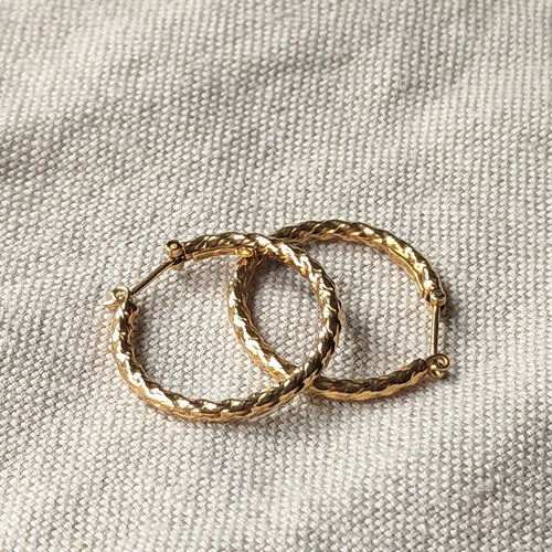 vintage 9ct gold 80s hoops on linen