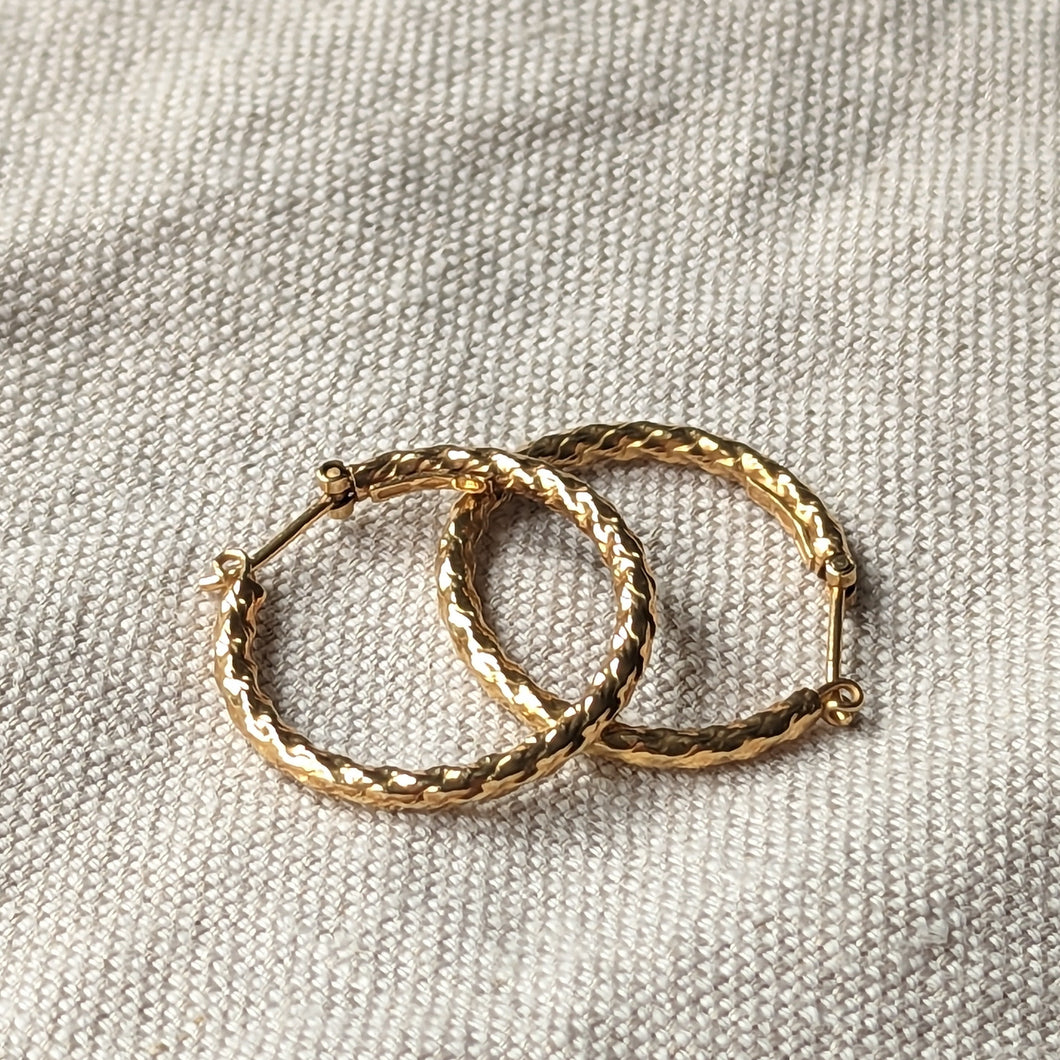 vintage 9ct gold 80s hoops on linen