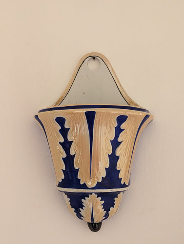 blue and cream ceramic wall mount