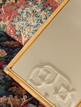 Load image into Gallery viewer, cane and bamboo mirror on floral sofa

