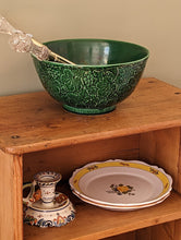 Load image into Gallery viewer, green majolica bowl with serving tongs on wooden shelf
