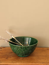Load image into Gallery viewer, green majolica bowl with serving tongs on wooden shelf

